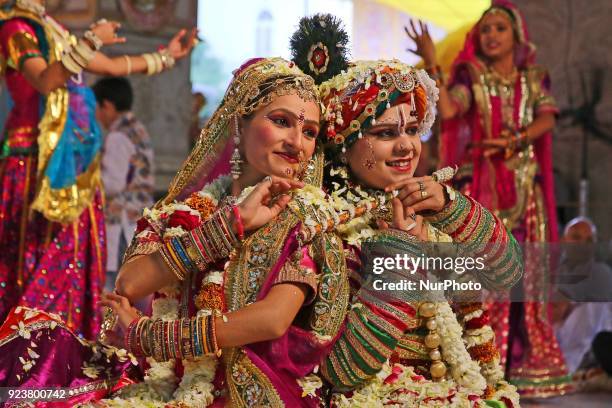 Rajasthani folk artists perform during the Fag Mahotsav celebration at historical Govind Dev Ji temple ahead the Holi festival , in Jaipur, Rajasthan...