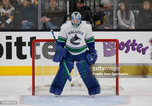 Vancouver Canucks goaltender Anders Nilsson stands by the goal during the first period of a regular season NHL game between the Vancouver Canucks and...