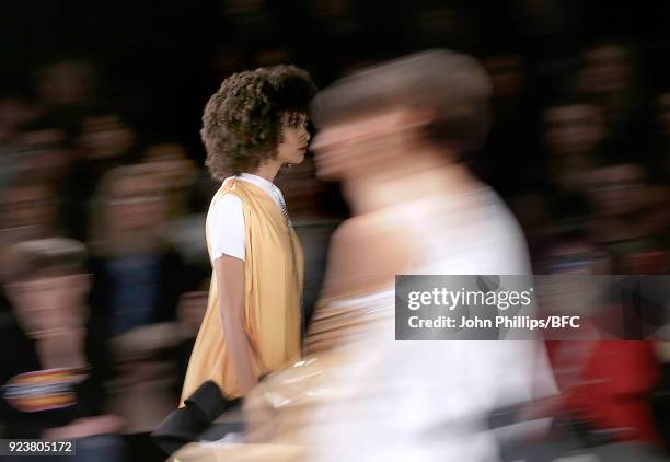 Models walk the catwalk at the Trend show during the London Fashion Weeks Festival February 2018 on February 23, 2018 in London, United Kingdom.