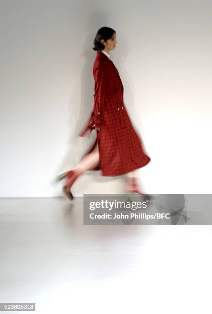 Model walks the catwalk at the Jamie Wei Huang show during the London Fashion Weeks Festival February 2018 on February 23, 2018 in London, United...