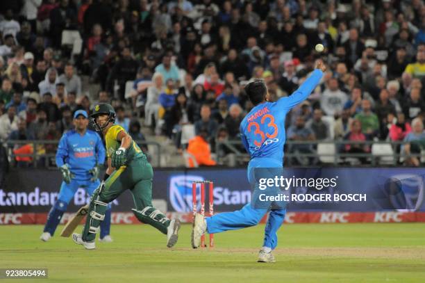 South Africa's J.P. Duminy hits a ball towards India's Hardik Pandya during the T20 cricket match against India vs South Africa, at Newlands Stadium,...