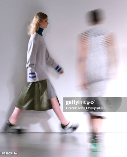 Models walk the catwalk at the Jamie Wei Huang show during the London Fashion Weeks Festival February 2018 on February 23, 2018 in London, United...