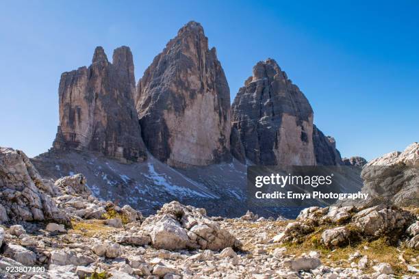 drei zinnen - tre cime di lavaredo - three peaks - three objects stock pictures, royalty-free photos & images