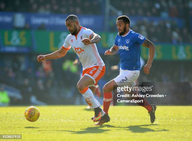 Blackpool's Kyle Vassell battles with Portsmouth's Anton Walkes during the Sky Bet League One match between Portsmouth and Blackpool at Fratton Park...