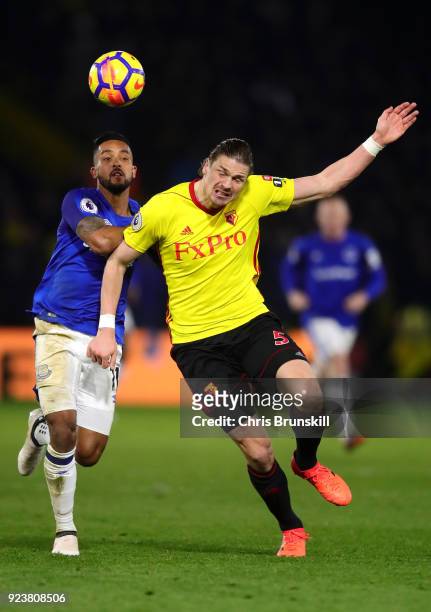Theo Walcott of Everton and Sebastian Prodl of Watford battle for the ball during the Premier League match between Watford and Everton at Vicarage...