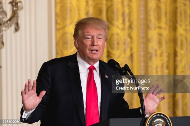 President Donald Trump speaks, during his joint press conference with Prime Minister Malcolm Turnbull of Australia, in the East Room of the White...