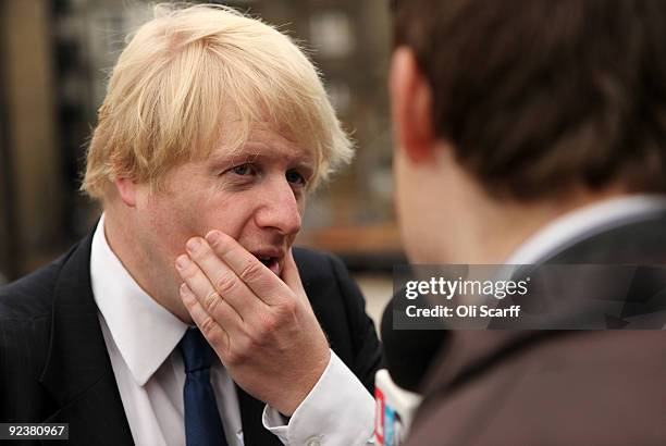 Mayor of London, Boris Johnson, is interviewed on a balcony overlooking the Crossrail construction site at Tottenham Court Road tube station on...