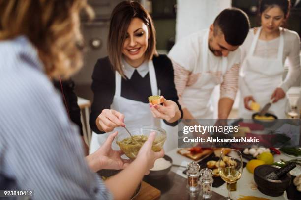 making bruschetta at a cooking class - man baking bread stock pictures, royalty-free photos & images