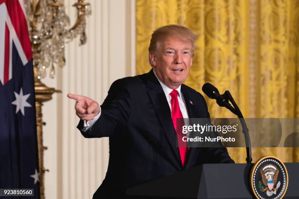 President Donald Trump speaks, during his joint press conference with Prime Minister Malcolm Turnbull of Australia, in the East Room of the White...