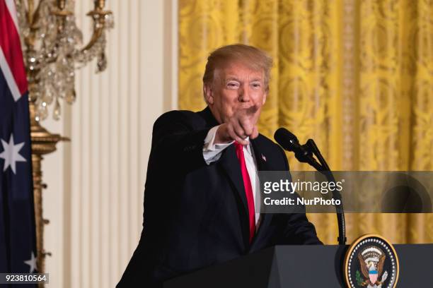 President Donald Trump speaks, during his joint press conference with Prime Minister Malcolm Turnbull of Australia, in the East Room of the White...