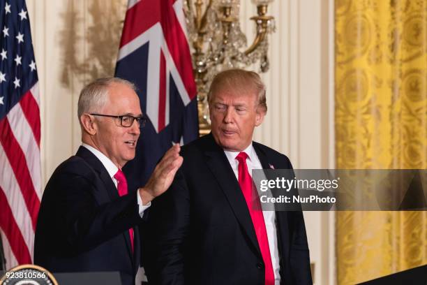 President Donald Trump , and Prime Minister Malcolm Turnbull of Australia , leave after their joint press conference in the East Room of the White...
