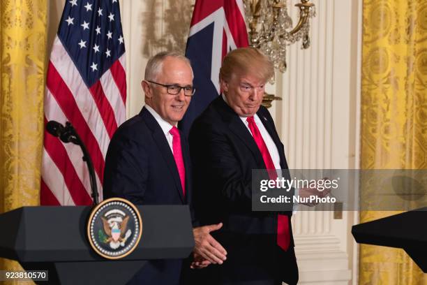 President Donald Trump , and Prime Minister Malcolm Turnbull of Australia , leave after their joint press conference in the East Room of the White...