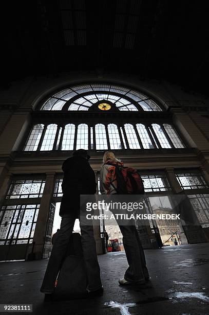 File photo taken on October 19, 2009 shows passengers waiting for information about a planned open-ended rail strike inside the Keleti railway...