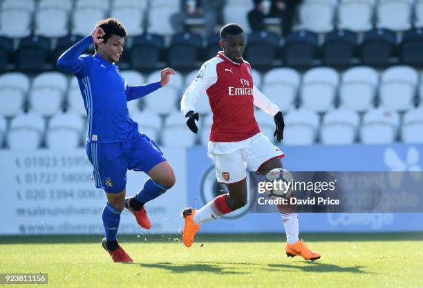 Eddie Nketiah of Arsenal bursts past K Darick Morrisof Dinamo during the match between Arsenal and Dinamo Zagreb at Meadow Park on February 24, 2018...