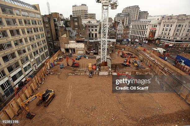 Construction workers continue work on the Crossrail construction site at Tottenham Court Road tube station on October 27, 2009 in London, England. Mr...