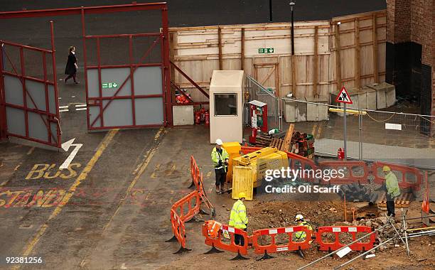Construction workers continue work on the Crossrail construction site at Tottenham Court Road tube station on October 27, 2009 in London, England. Mr...
