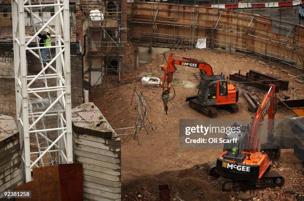 Construction workers continue work on the Crossrail construction site at Tottenham Court Road tube station on October 27, 2009 in London, England. Mr...