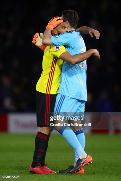 Adrian Mariappa and Costel Pantilimon of Watford embrace following the Premier League match between Watford and Everton at Vicarage Road on February...