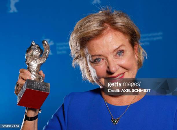 Ana Brun of Paraguay poses with her the Silver Bear prize for best actress for her role in "The Heiresses" during the awards ceremony of the 68th...