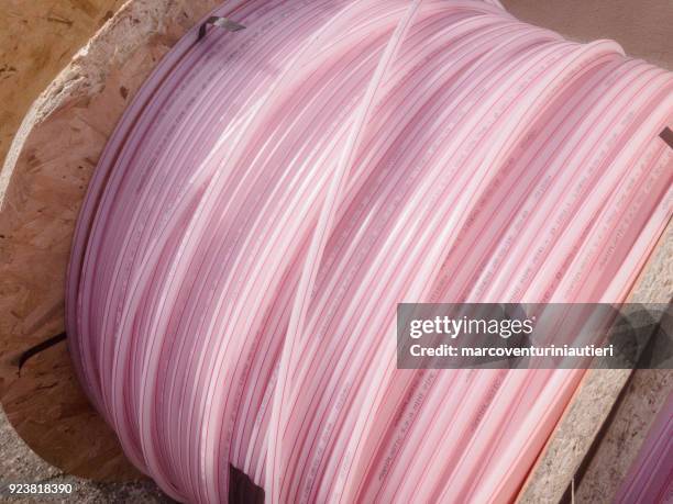 polyethylene tubes to be interred for telecommuncations use - marcoventuriniautieri stock pictures, royalty-free photos & images