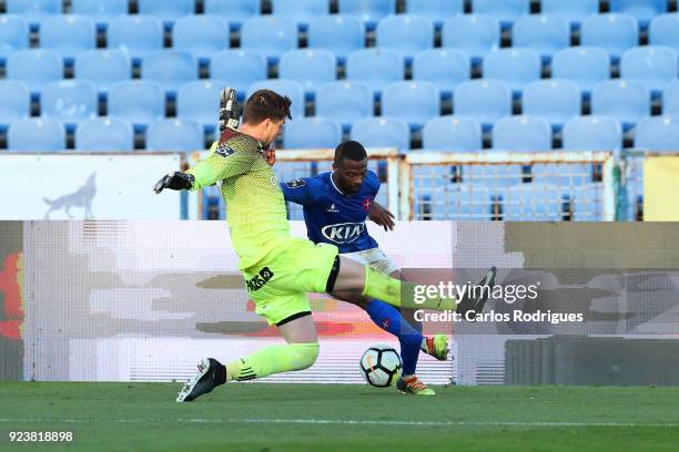 Os Belenenses forward Fredy from Angola vies with Feirense goalkeeper Caio Secco from Brasil for the ball possession during the Primeira Liga match...