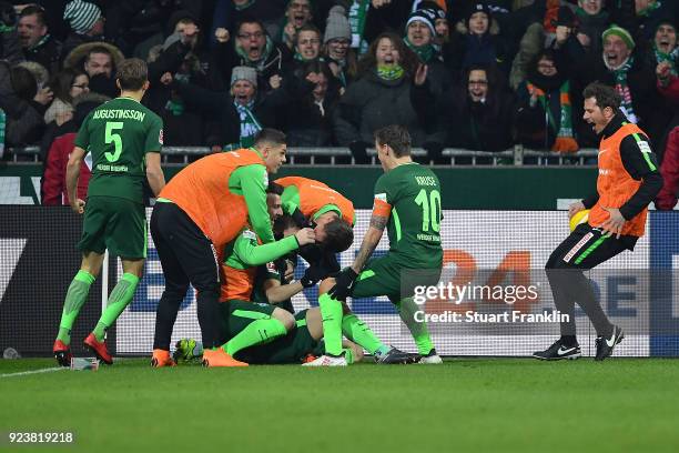 Players of Bremen celebrate after Ishak Belfodil of Bremen scored a goal to make it 1:0 during the Bundesliga match between SV Werder Bremen and...