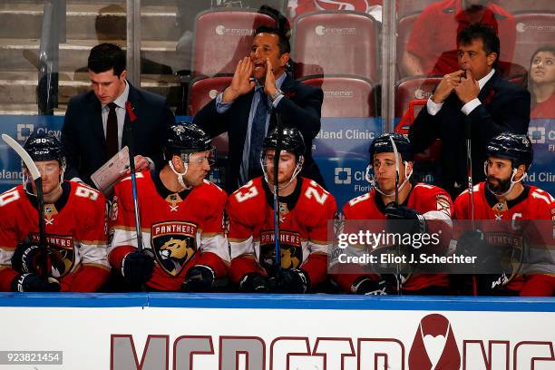 Florida Panthers Head Coach Bob Boughner directs his team in the third period along with Assistant Coach Paul McFarland and Associate Coach Jack...