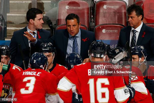 Florida Panthers Head Coach Bob Boughner directs his team in the third period along with Assistant Coach Paul McFarland and Associate Coach Jack...