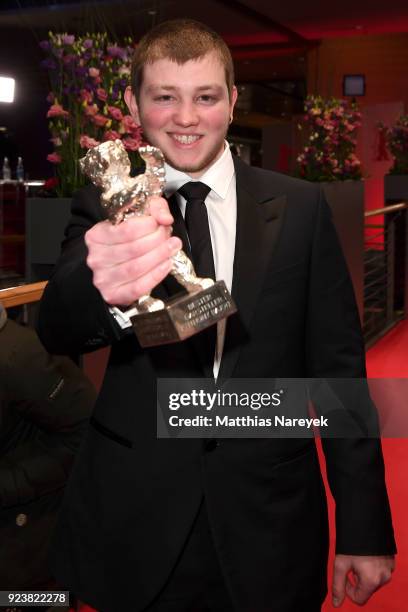 Anthony Bajon, winner of the Silver Bear for Best Actor for 'The Prayer', poses with his award after the closing ceremony during the 68th Berlinale...
