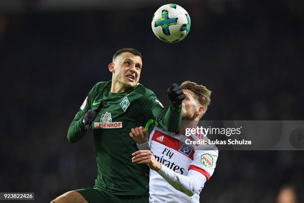 Maximilian Eggestein of Bremen fights for the ball with Aaron Hunt of Hamburg during the Bundesliga match between SV Werder Bremen and Hamburger SV...