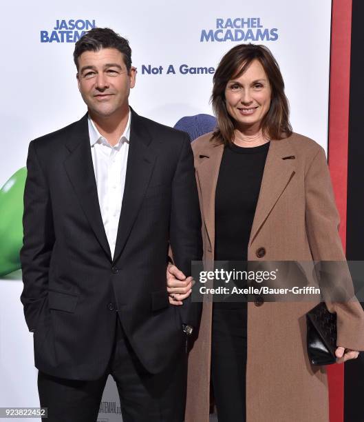 Actor Kyle Chandler and screenwriter Kathryn Chandler arrive at the Los Angeles premiere of 'Game Night' at TCL Chinese Theatre on February 21, 2018...