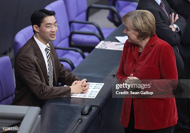 German Chancellor and Chairwoman of the German Christian Democrats Angela Merkel and Philipp Roesler, new German Health Minister designate and member...