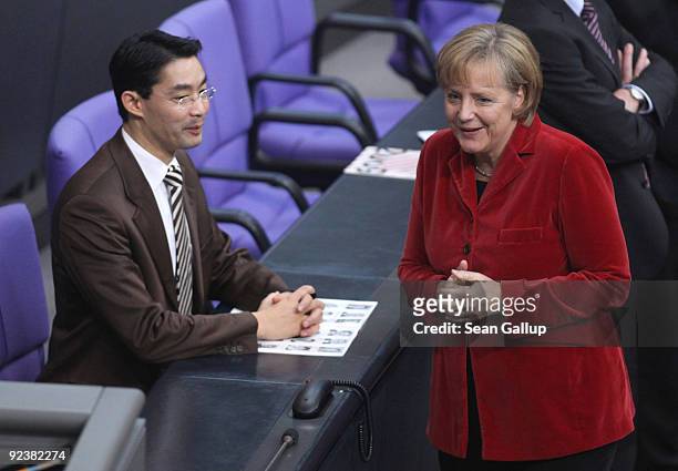 German Chancellor and Chairwoman of the German Christian Democrats Angela Merkel and Philipp Roesler, new German Health Minister designate and member...