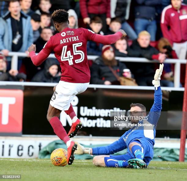 Gboly Ariyibi of Northampton Town attempts to take the ball past Simon Eastwood of Oxford United during the Sky Bet League One match between...