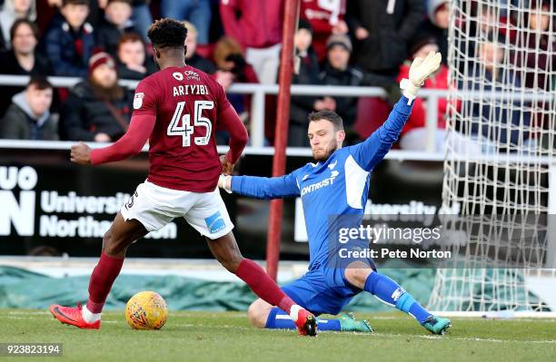 Gboly Ariyibi of Northampton Town attempts to take the ball past Simon Eastwood of Oxford United during the Sky Bet League One match between...
