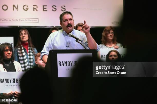Randy Bryce speaks at a rally on February 24, 2018 in Racine, Wisconsin. Bryce, a union ironworker, is hoping to defeat House Speaker Paul Ryan to...