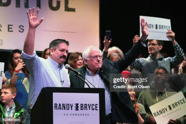 Sen. Bernie Sanders campaigns with Randy Bryce at a rally on February 24, 2018 in Racine, Wisconsin. Bryce, a union ironworker, is hoping to defeat...