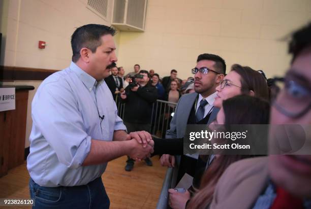 Randy Bryce greets guests at a rally on February 24, 2018 in Racine, Wisconsin. Bryce, a union ironworker, is hoping to defeat House Speaker Paul...