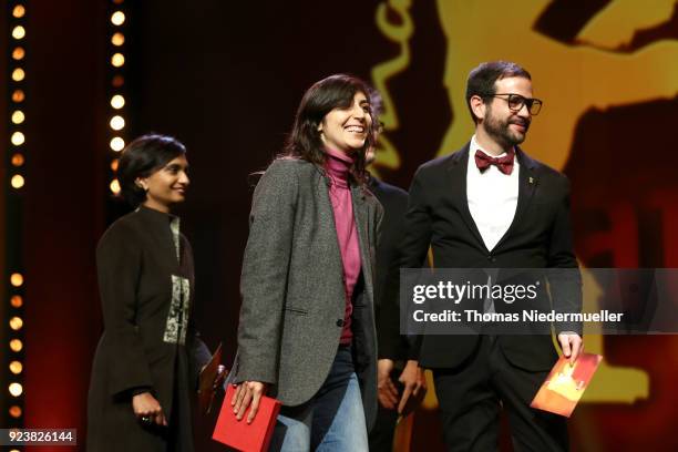 Ines Moldavsky, winner of the Golden Bear for Best Short Film for the movie 'The Men Behind the Wall' and jury member Diogo Costa Amarante are seen...