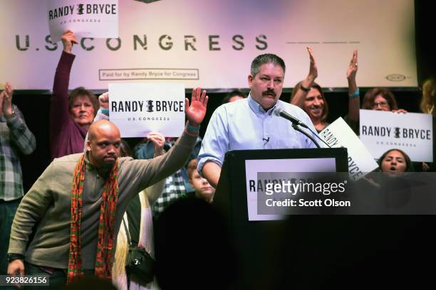 Randy Bryce speaks at a rally on February 24, 2018 in Racine, Wisconsin. Bryce, a union ironworker, is hoping to defeat House Speaker Paul Ryan to...