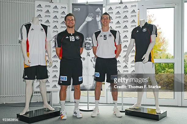 Michael Kraus and Dominik Klein present the new national shirt during Team presentation of the German Handball National Team at the Gerry Weber...