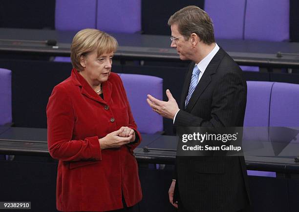 Chairman of the German Free Democrats and new German Vice Chancellor and Foreign Minister designate Guido Westerwelle and German Chancellor and...