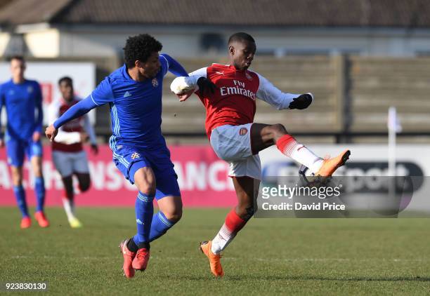 Eddie Nketiah of Arsenal bursts past K Darick Morris of Dinamo during the match between Arsenal and Dinamo Zagreb at Meadow Park on February 24, 2018...