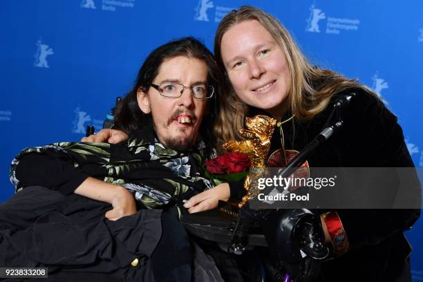 Christian Bayerlein and Grit Uhlemann pose with the Golden Bear Award for Best Film 'Touch Me Not' at the award winners photo call during the 68th...