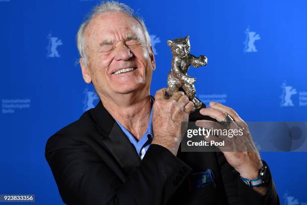Bill Murray poses with the award he accepted for Wes Anderson, winner of the Silver Bear for Best Director for 'Isle of Dogs', at the Award Winners...