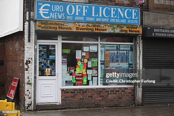 Shops selling alcohol vie for trade on Moston lane which has been dubbed 'Alcohol Alley' on October 27, 2009 in Manchester, England. Moston Lane has...