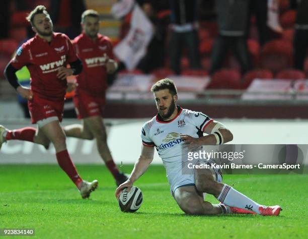 Ulster's Stuart McCloskey scores his side's first try during the Guinness Pro14 Round 16 match between Scarlets and Ulster Rugby at Parc y Scarlets...