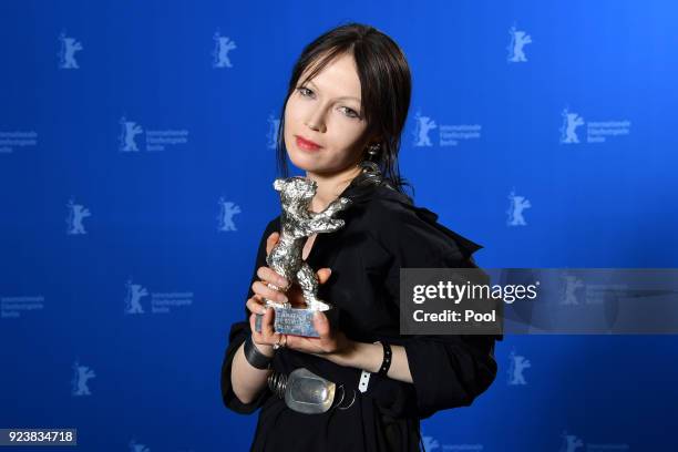 Elena Okopnaya, winner of the Silver Bear for an Outstanding Artistic Contribution for 'Dovlatov', poses at the Award Winners photo call during the...