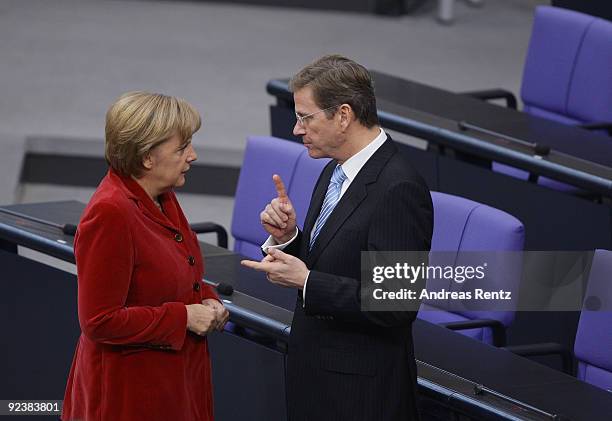 Chairman of the German Free Democrats and new German Vice Chancellor and Foreign Minister designate Guido Westerwelle and German Chancellor and...