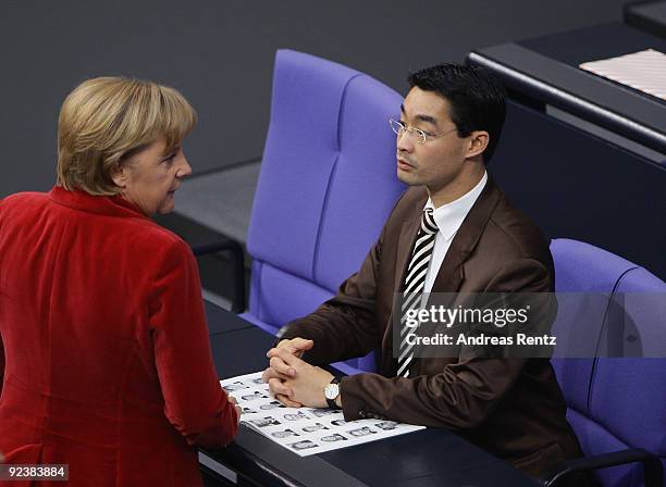 Upcoming Health Minister Philipp Roesler of the German Free Democrats and German Chancellor and Chairwoman of the German Christian Democrats Angela...